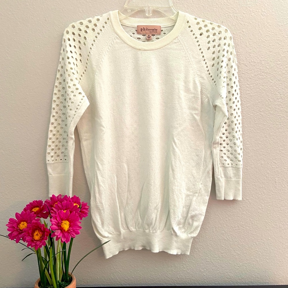 Soft sweater with cut out detail